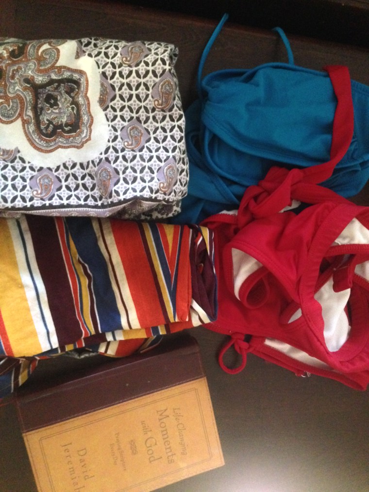 Day 5: 2 swimsuits, two dress tops, and a book. 